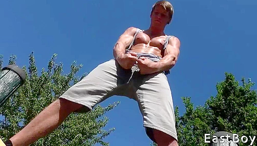 Sweat-Slicked Muscle God Rick Palmer Flexes Hard Outdoors – EastBoys Fetish