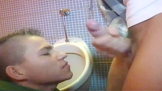 Steamy Encounter: Marco Gives Robin Head in Public Restroom Stall – GayXXX