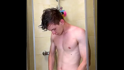 Slender Teen Soaks Under Steamy Spray, Flashing His Juicy Uncut Cock –